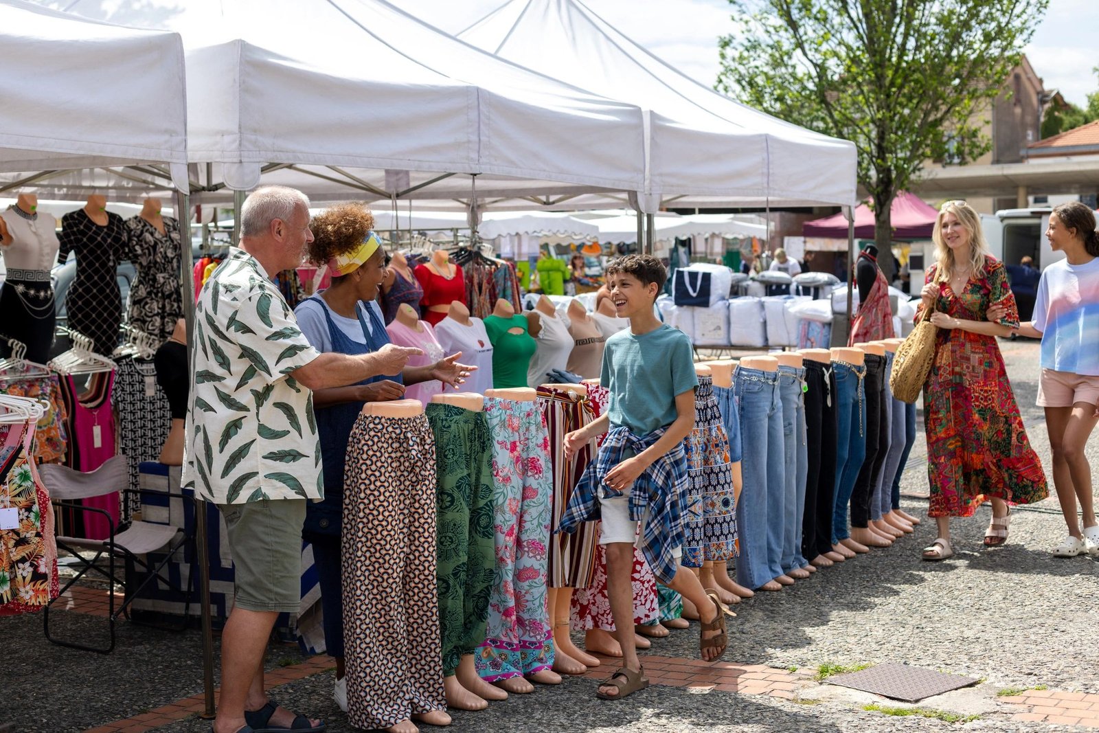 Family walking through an outdoor market